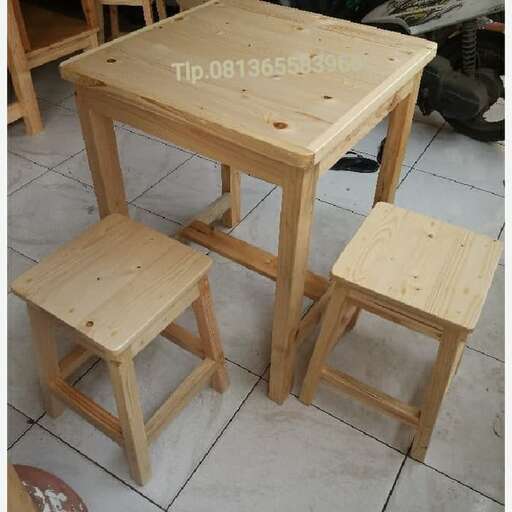 a set of stools made from a wooden pallet