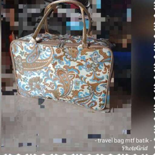 a bag with a floral print on it.
