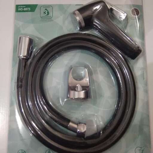 a black cord wrapped in plastic and a tube