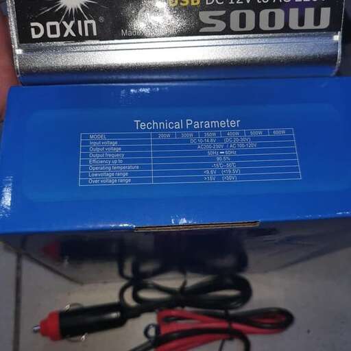 a box with a battery and a set of wires.