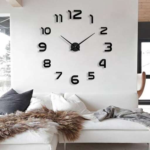 a white couch with a clock on it and a couch