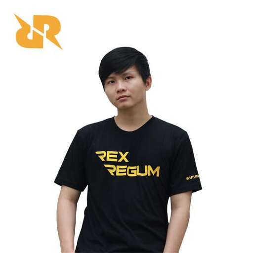 a boy in black t - shirt with a yellow logo on the front.