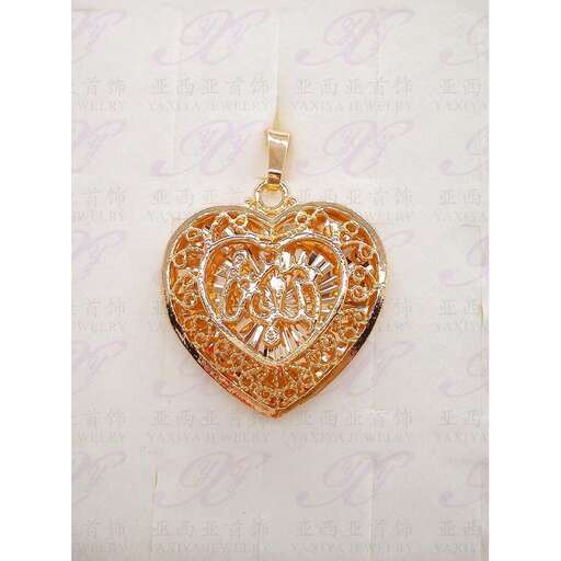 a heart shaped pendant in gold with a heart shape.