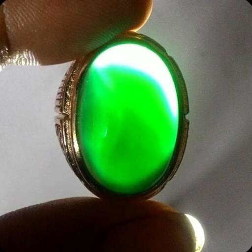 a ring with a green glow in the dark.