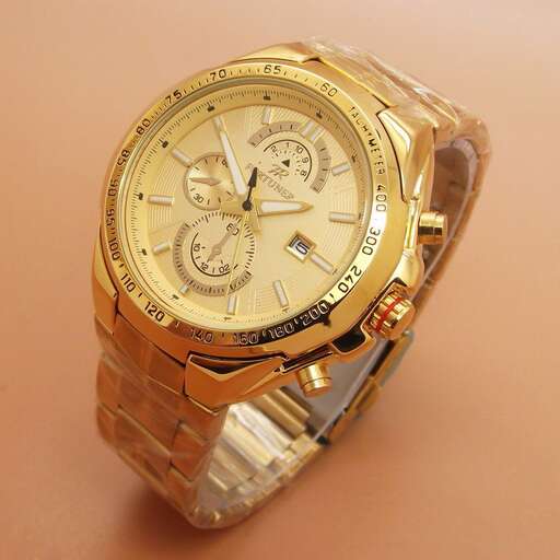 a gold watch with a face