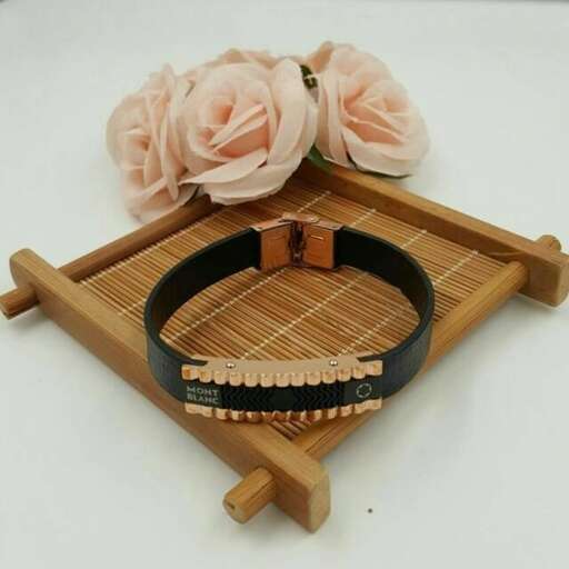 handmade wooden bracelet with flower and wooden bracelet. made by me.