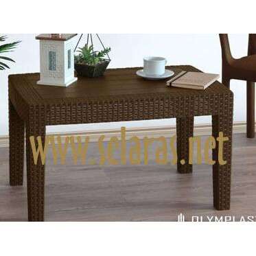 a large wooden table with a white cup and a cup on top.