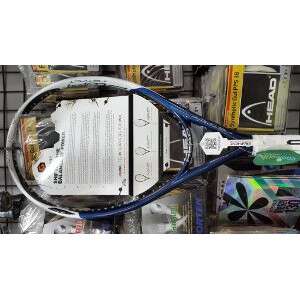 a tennis racket in a shopping cart.