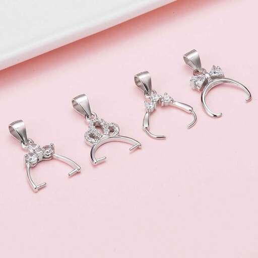 a pair of sterling silver earrings