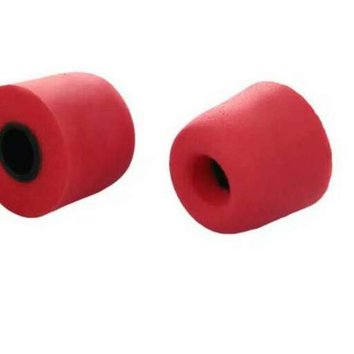 a red plastic tube for the toilet