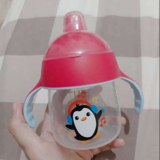 penguin in a baby bottle