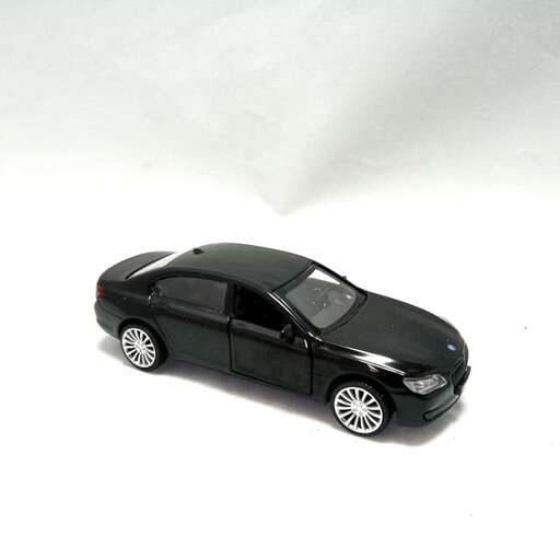 a black car with a white background