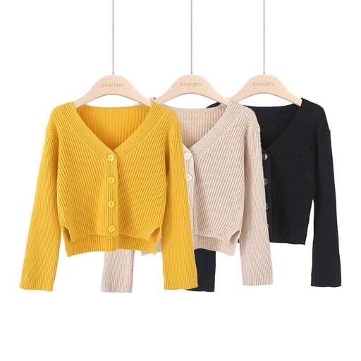 a yellow cardigan with a sweater