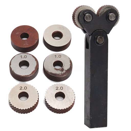 a set of screws with a screwdriver.