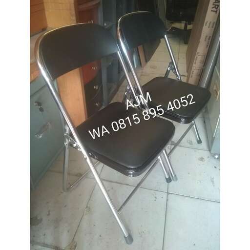 a chair with a black seat and a metal frame