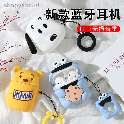 a group of stuffed animals sitting on top of a white sheet.