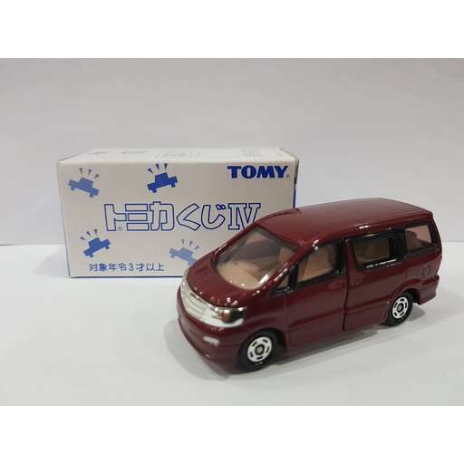 a toy car with a cat in the back