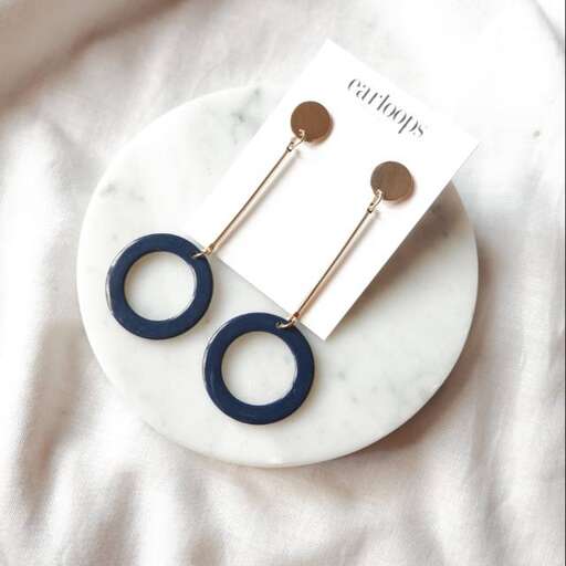 a pair of scissors on a white plate.