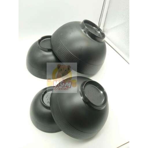 a black plastic trash can with a lid on top of it.