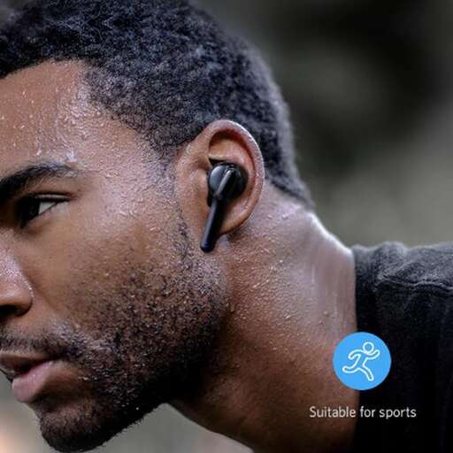a man with earphones on his ears