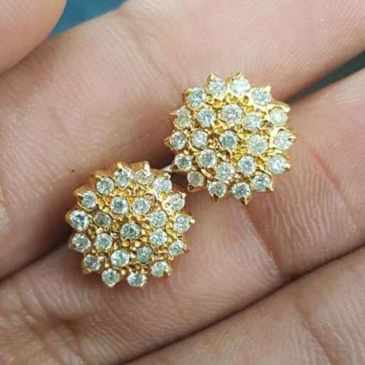 a pair of 18k yellow gold and diamond earrings