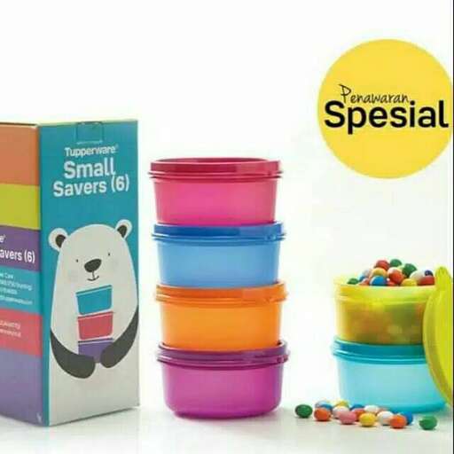 a box of colorful plastic containers with a colorful container of pills.