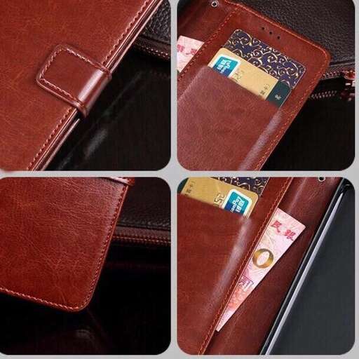 a brown leather wallet with a credit card in it.