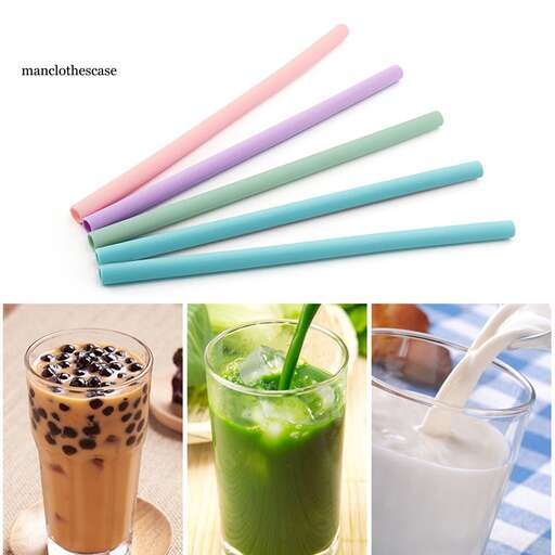 a colorful drink with straws and a spoon.