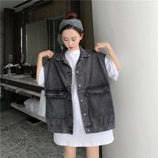 a girl in a white dress and denim jacket