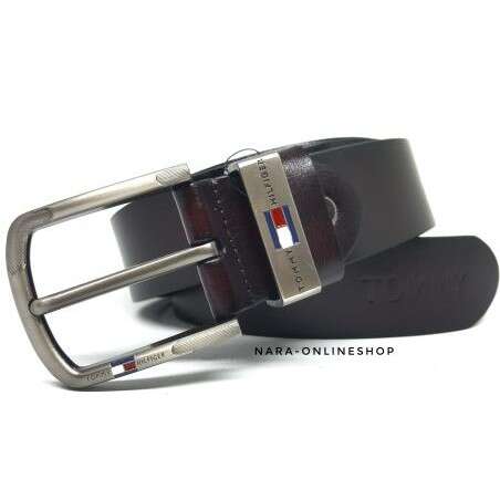 a leather belt with a logo on the front.