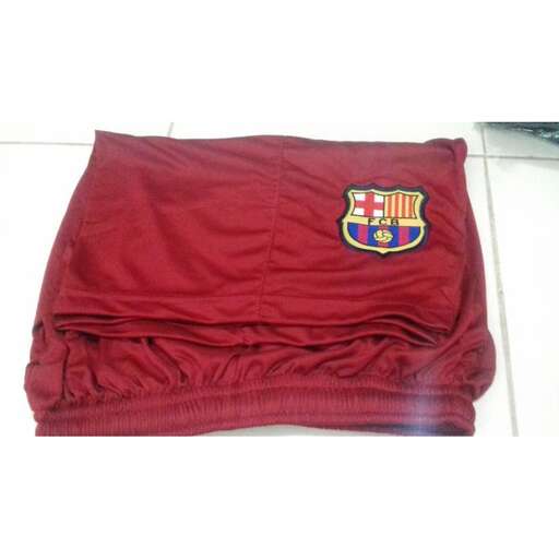 the red towel is folded to match the team.