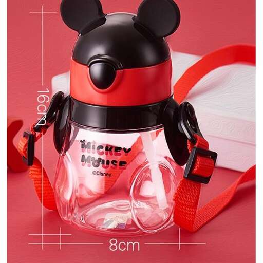 a bottle of water with a red strap.