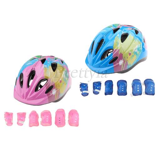 a set of three - wheeled bicycle helmets