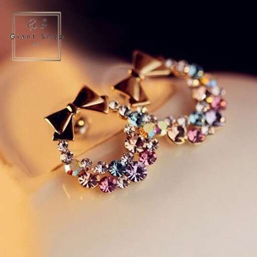 a bracelet with a bow and a flower