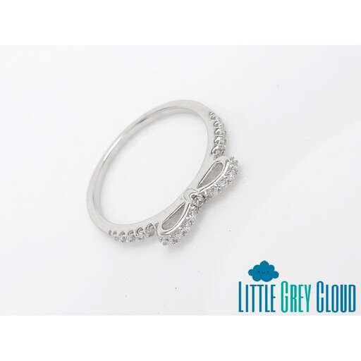 a sterling silver ring with a little bit of sparkle.