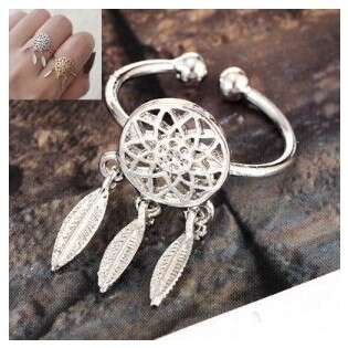 a sterling silver ring with a flower and leaf.