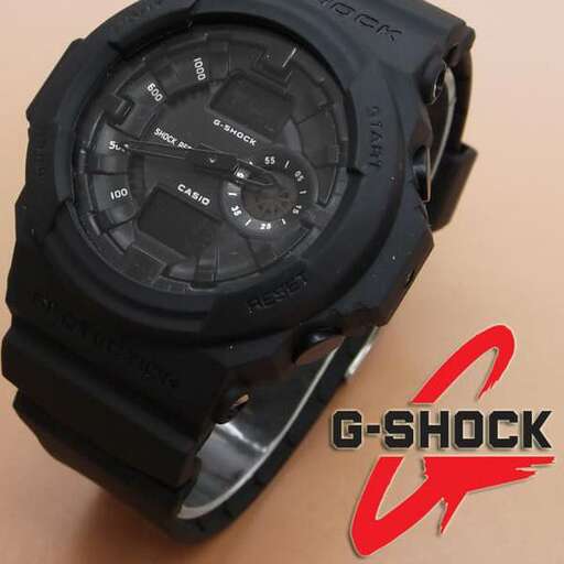 a black watch with a red symbol on the front.