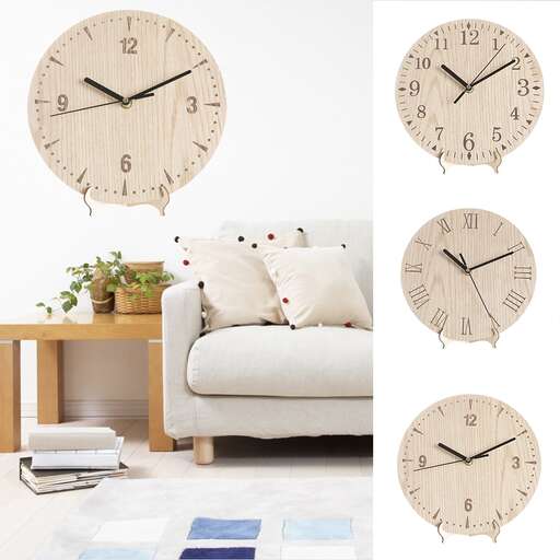 a wall clock with a vase of flowers on it