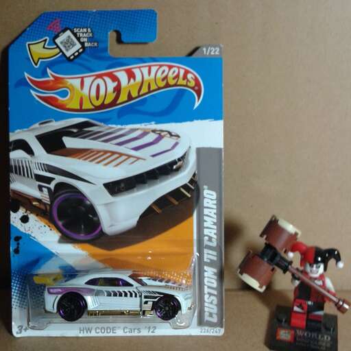 a toy car and a toy car from the 1950s.