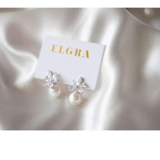 earrings in white with gold on a white background