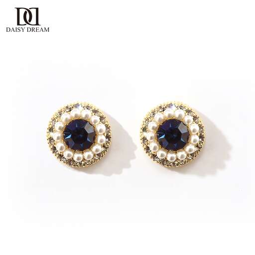 earrings with a black sapphire and diamond