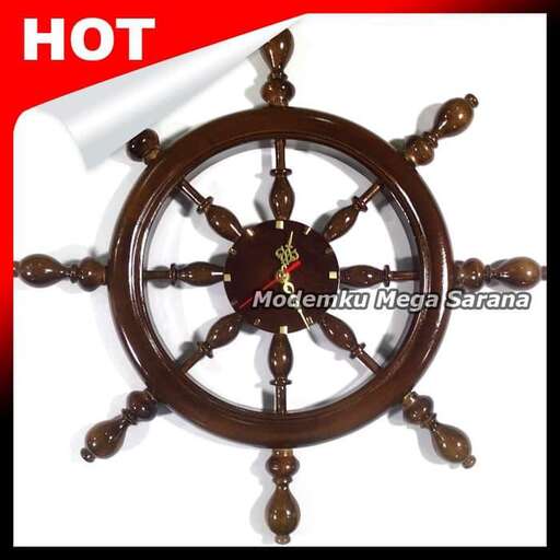 a wooden steering wheel on a boat