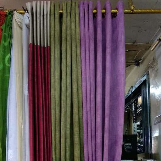 a curtain hanging in a shop in the old city of san francisco.
