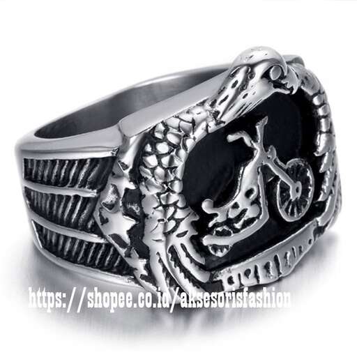 sterling silver ring with a skull and crossbones design in black and silver