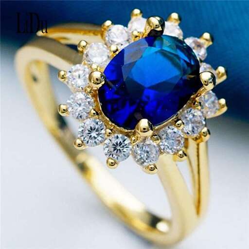 a sapphire and diamond ring, by person