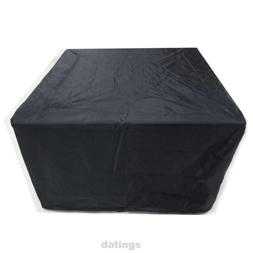 a black box covered in a black tarp.