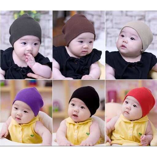baby girl in a yellow dress