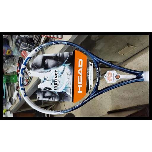 a tennis racket with a picture of a tennis player.