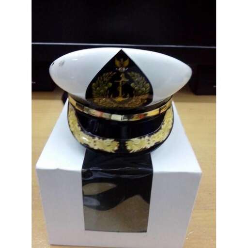 a pilot's hat in a box