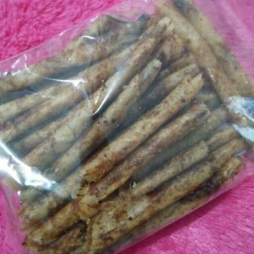 a bag of crackers on a pink towel.